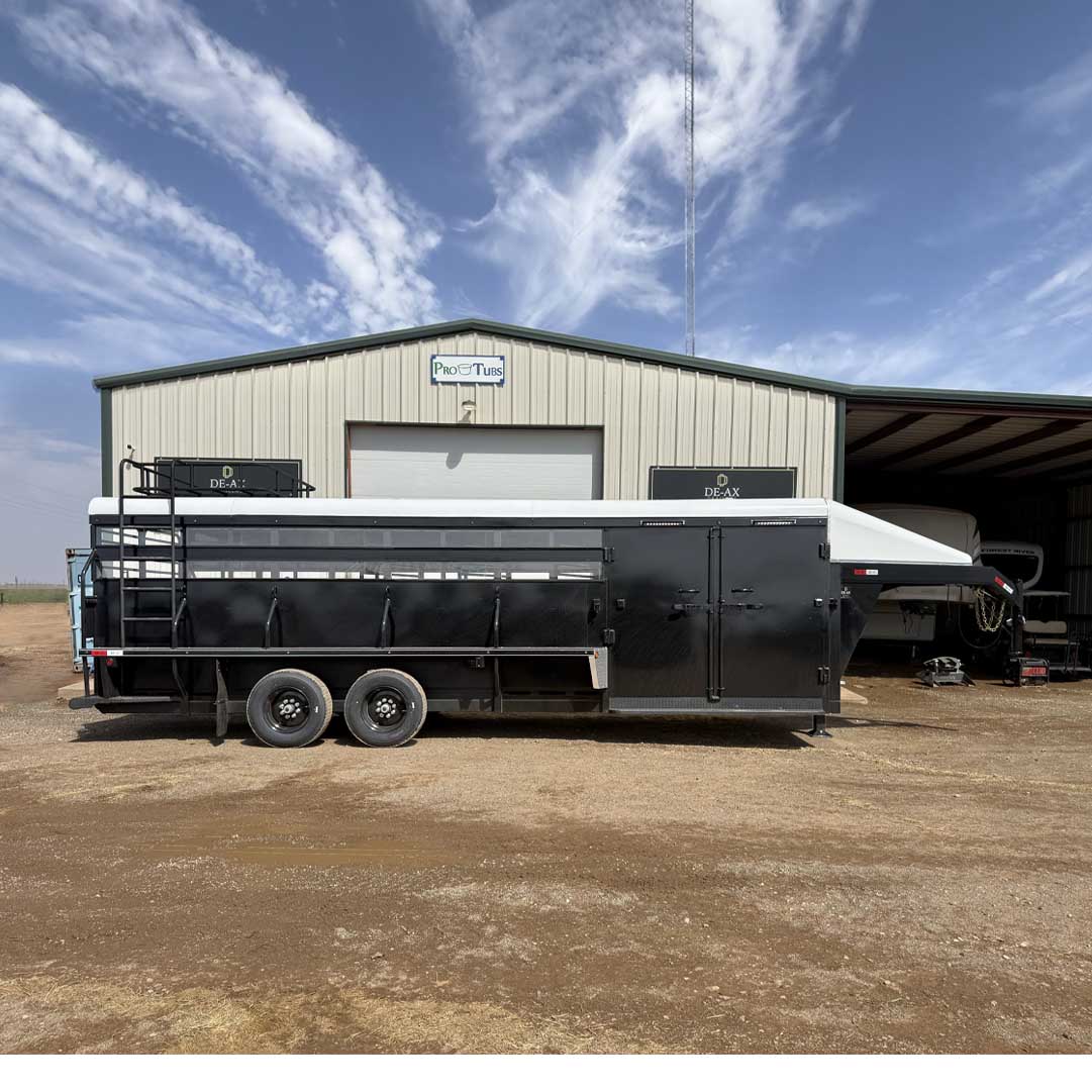 Full side view of a heavy-duty 25' smart tack livestock combo trailer with dual axles.